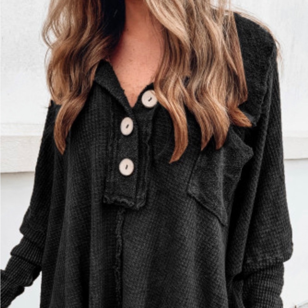 Black waffle knit buttoned long sleeve top